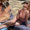 Bikini-clad Isla Fisher, 49, jokes she should be 'nominated for a SAG Award' as she reveals her boobs 'don't sit where they used to'