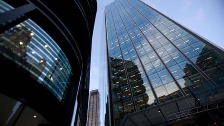 FTSE posts new closing high as falls in defence stocks are offset by retail gains