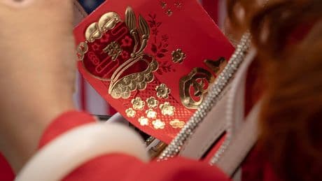 Red Envelopes With Cash Are Changing Hands at Adams Campaign Rallies
