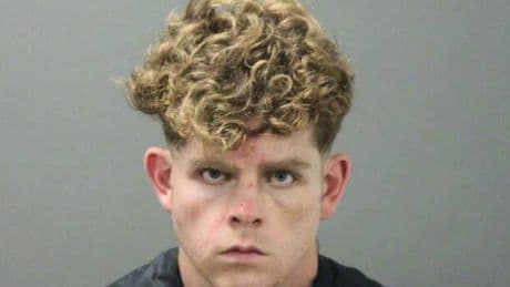 Teacher admits to stabbing couple to death while they were hiking with their children in Arkansas, police say