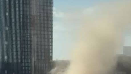 Terrifying moment ‘dust DEVIL’ rips through UK city centre bringing traffic to a standstill