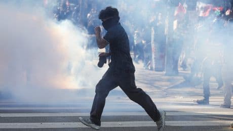 Police deploy tear gas as ‘No Kings’ protesters rally against Trump