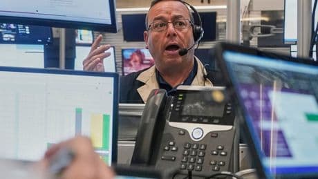 Asian shares are mixed as reports show improved factory outlook for China