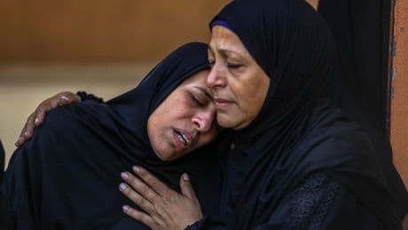 'Massacre' kills 51 Palestinians as they wait for food at controversial aid point
