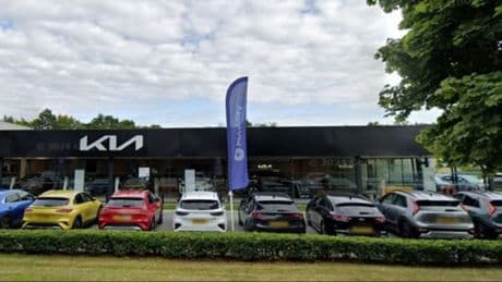 Car dealership still lying abandoned after its sudden closure two YEARS ago – as decision on new plans is delayed again