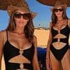 Amy Childs defiantly poses in a black swimsuit as she reminisces over sun-soaked holiday - after hitting back at trolls over extreme weight loss