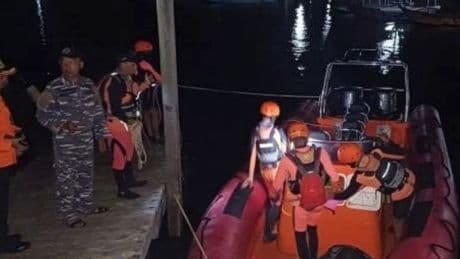 Two dead after ferry carrying more than 60 people sinks off the coast of Bali
