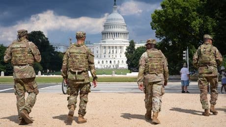 National Guard vehicle collides with civilian car near US Capitol, trapping one person