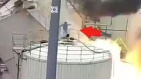 Moment worker dodges death by just inches as chemical tanks explode killing five