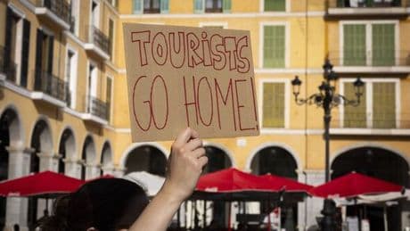 Tourists 'surrounded and jeered' by protesters on beautiful island loved by Brits