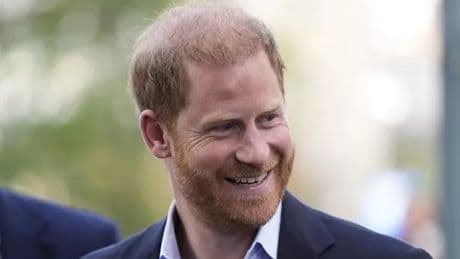 Beaming Prince Harry steps out in London as window for King Charles meeting opens up
