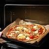 You've been cooking pizza WRONG! Experts reveal the secret to achieving restaurant-quality slices at home - and why you should never use the top shelf of the oven