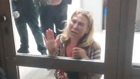 Dramatic moment Ryanair passenger sobs as hand luggage row sees her banned from flight
