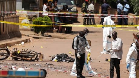 2 people die before a suspected explosive attack in Uganda's capital, authorities say