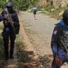 Official says gangs killed dozens in small fishing village in Haiti's latest massacre
