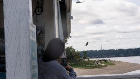 Flying boats make for a rare sight as Washington clears an island of derelict vessels by helicopter
