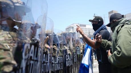 Trump orders law enforcement to ‘liberate’ LA from ‘migrant invasion’ amid clashes over ICE raids