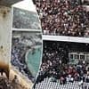 Three football fans dead and 70 injured in horror of Algeria stadium disaster - as supporters fall from stand after barrier breaks amid title celebrations