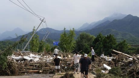 Heavy rains and flooding kill at least 34 people in and near Beijing
