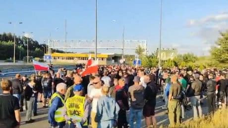 Football fans form ‘citizen patrols’ to block migrants return as tensions rise