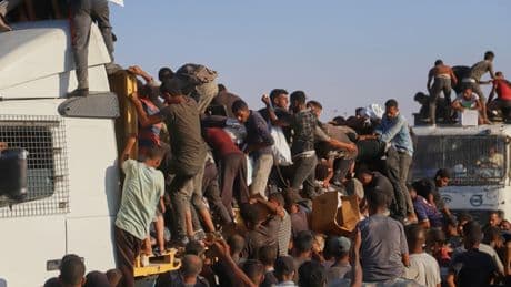 Gaza aid truck drivers face increasing danger from desperate crowds and armed gangs
