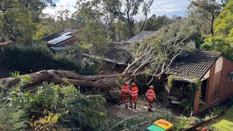 Thousands of Australians without power and flash flood warnings in place after ‘bomb cyclone’