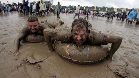 ‘Someone stole my wellies!’: Glastonbury’s five muddiest years