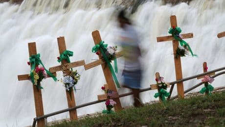 Search for Texas flood victims to resume after pause due to heavy rains