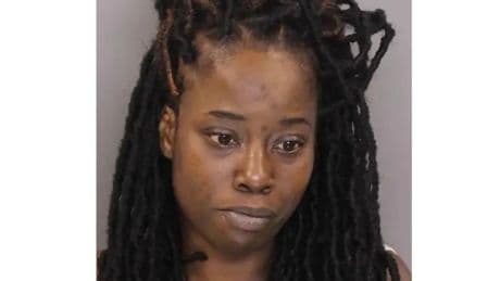 Woman imprisoned for 50 years after decomposing bodies of niece and nephew found in car during traffic stop