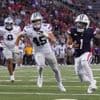 Ismail Mahdi runs for 189 yards, Arizona holds off Kansas State rally for 23-17 win