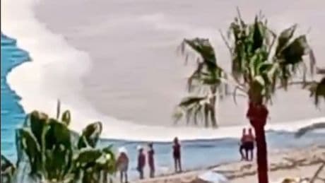 Spain holiday resort horror as huge, bubbling mass turns sea brown