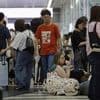 Heavy rains in Japan cause flooding and mudslides, and leave several people missing