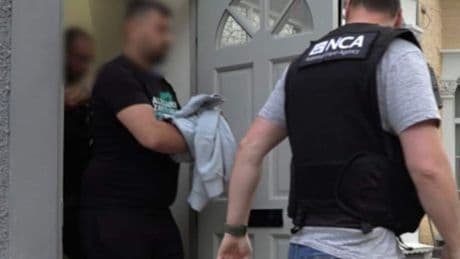 Inside dawn raids targeting 'London people smuggling gang' as four arrested