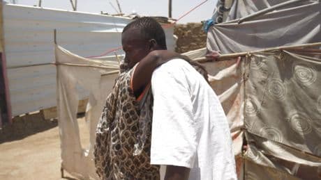 Man separated from his family for two years by war returns home to his mother's embrace