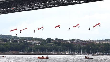 Greenpeace protesters close Forth Road Bridge after abseiling off the side
