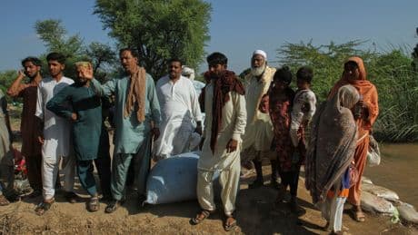 Floodwaters begin receding in a major Pakistani city but nearby towns face evacuations
