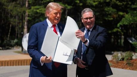 Keir Starmer shares real reason he picked Donald Trump's papers up off the ground