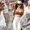 Lauren Sanchez ditches the heels after struggling to stay on her stiletto-clad feet during treacherous walk across a pebble beach - as she joins husband Jeff Bezos, Leonardo DiCaprio and Vittoria Ceretti for another double date in Ibiza