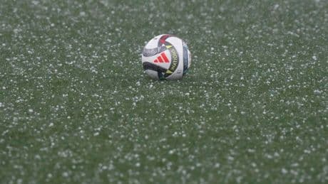 Germany vs Portugal Nations League clash DELAYED as players are forced to protect themselves from hailstones