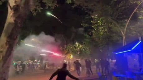 Real Betis and Fiorentina fans clash before Euro semi-final as supporters are attacked with FIREWORK GUN and chairs fly