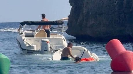 Moment unlucky tourists sink their rental boat in front of huge crowd