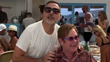Elton John dances with David Walliams as he enjoys retirement in France