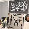 Terrorist's arsenal of weapons: Secret cache including a machete and an axe were hoarded by former student found guilty of possessing bomb-making video