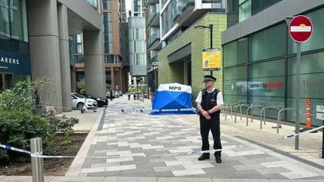 Woman in 20s dies after fall 'from height' near Canary Wharf tower block