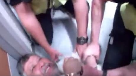 Dad dragged by cops from his dying daughter's bedside loses claim against them