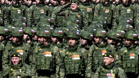 WW3 fears erupt as Vladimir Putin massing troops on border of NATO country