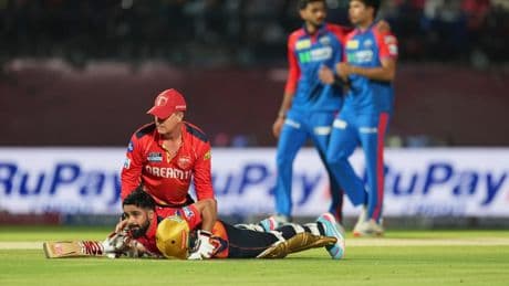 Terrified fans scream ‘bombs are coming’ as IPL match abandoned after stadium plunged into darkness as floodlights turned off