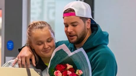 JoJo Siwa and Chris Hughes' tender reunion as they confirm romance and spend day in bed
