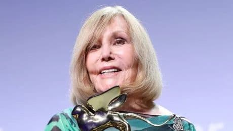 Kim Novak, 92, looks unrecognisable as she picks up lifetime award at Venice Film Festival