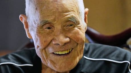 Japanese man becomes oldest to summit Mount Fuji at 102 with help from his family